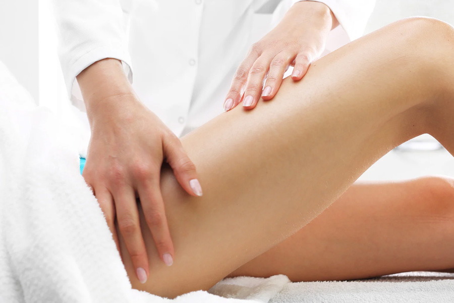 Visible improvement in cellulite after body sculpting treatment on thighs