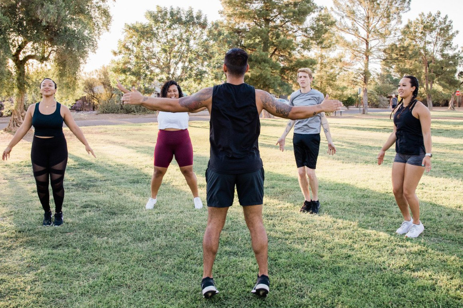 Health coach guiding client through personalized fitness routine — part of Wellness and Other Treatments Hilton Head