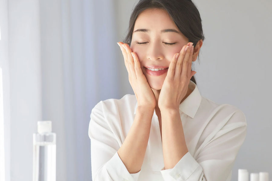 Woman with refreshed skin at a Hilton Head medical spa after laser resurfacing treatment.