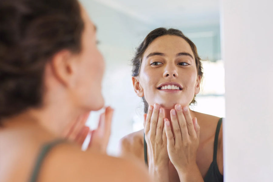 Woman enjoying instant glow after HydraFacial Hilton Head SC treatment